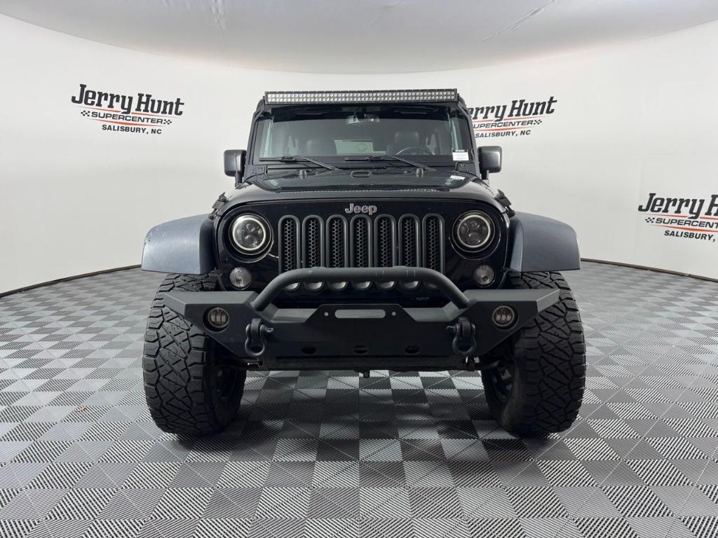 used 2016 Jeep Wrangler Unlimited car, priced at $18,534