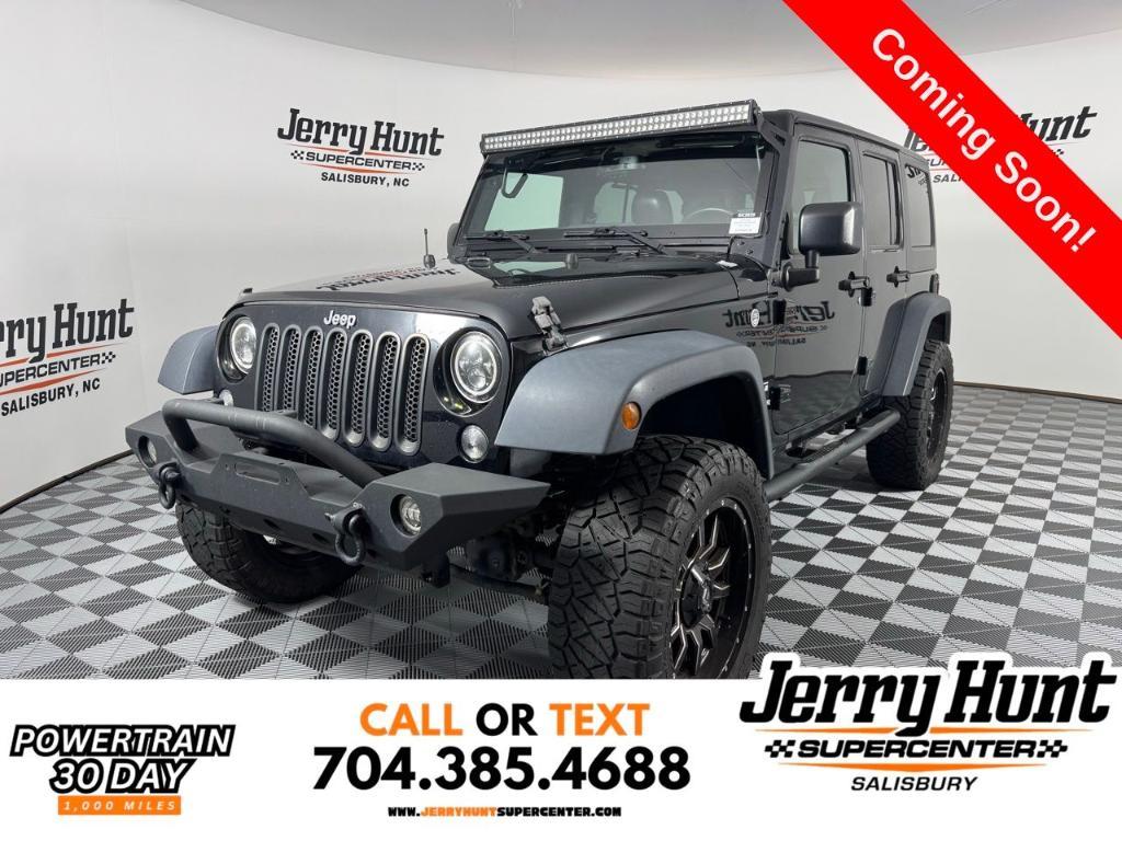 used 2016 Jeep Wrangler Unlimited car, priced at $18,534