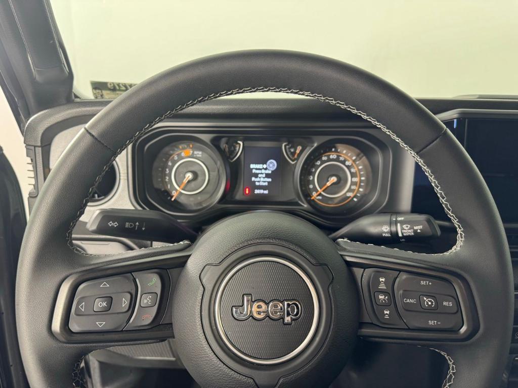 used 2025 Jeep Wrangler car, priced at $36,988