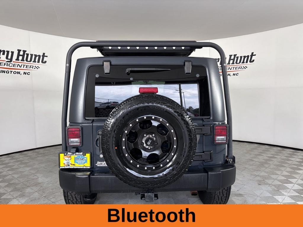 used 2016 Jeep Wrangler car, priced at $17,752