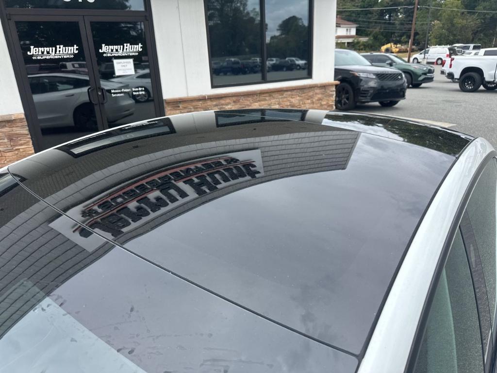 used 2023 Tesla Model 3 car, priced at $27,101
