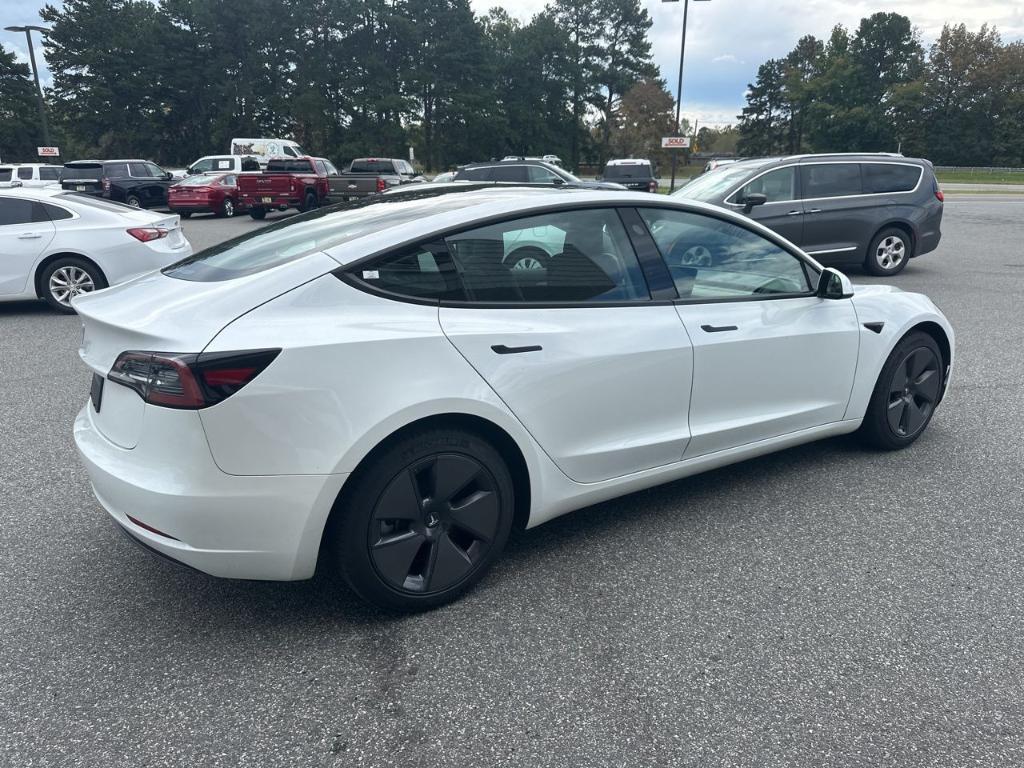 used 2023 Tesla Model 3 car, priced at $27,101