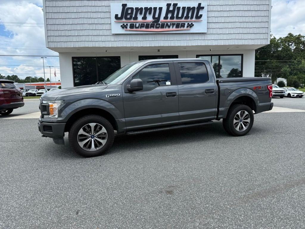 used 2019 Ford F-150 car, priced at $29,694
