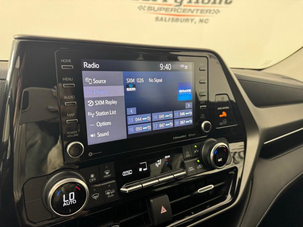 used 2021 Toyota Highlander Hybrid car, priced at $30,000
