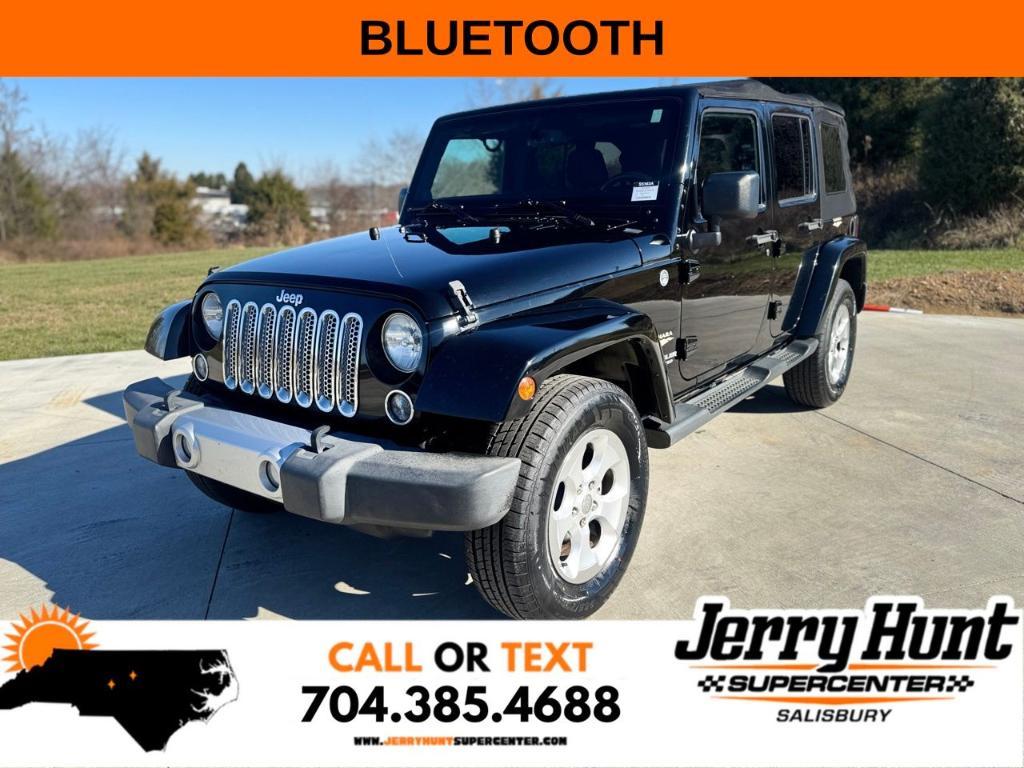 used 2014 Jeep Wrangler Unlimited car, priced at $14,500