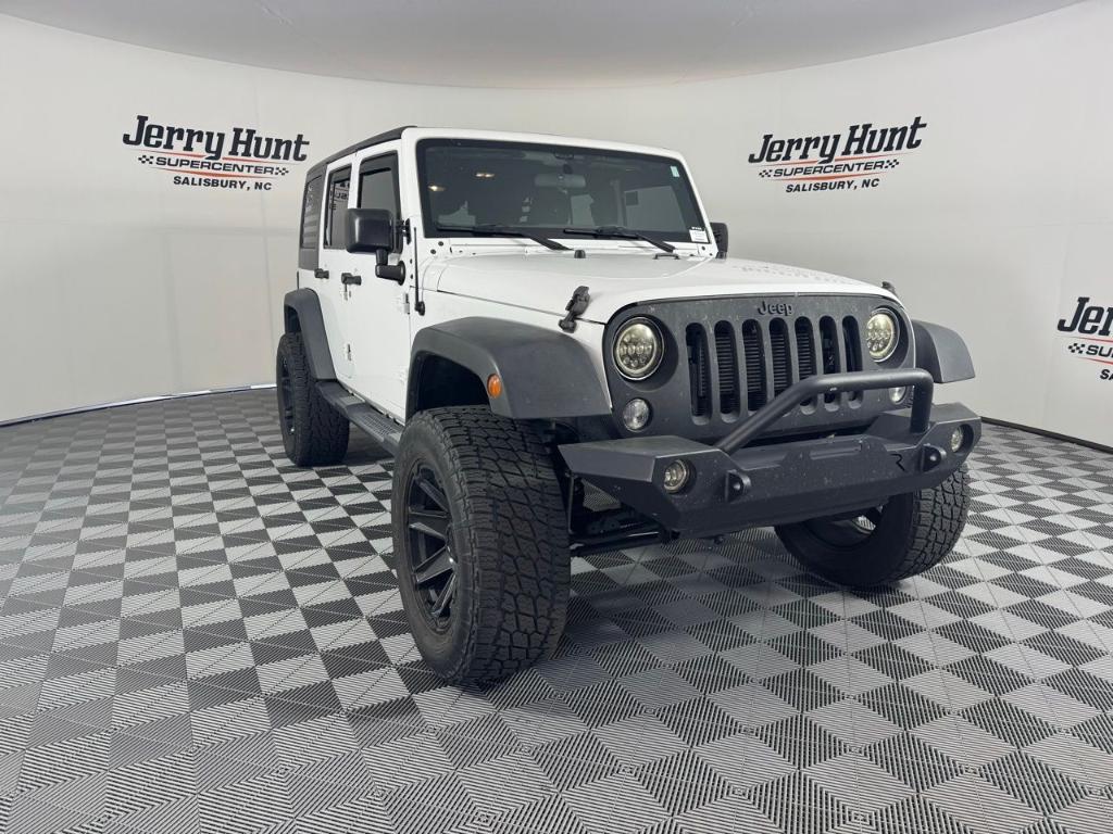 used 2016 Jeep Wrangler Unlimited car, priced at $16,588