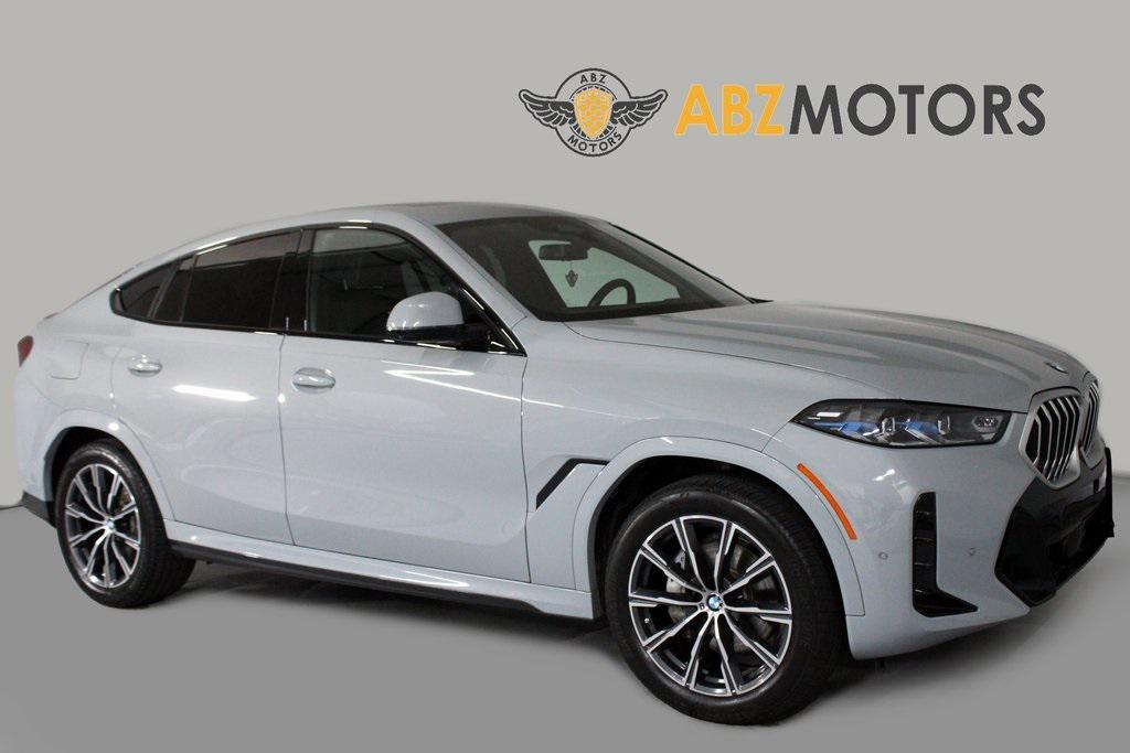 used 2025 BMW X6 car, priced at $73,491