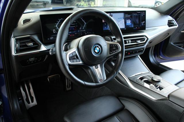 used 2023 BMW 330e car, priced at $34,991