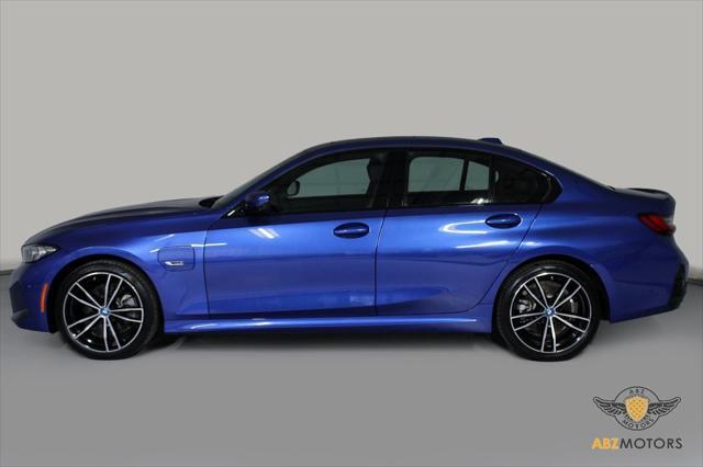 used 2023 BMW 330e car, priced at $34,991