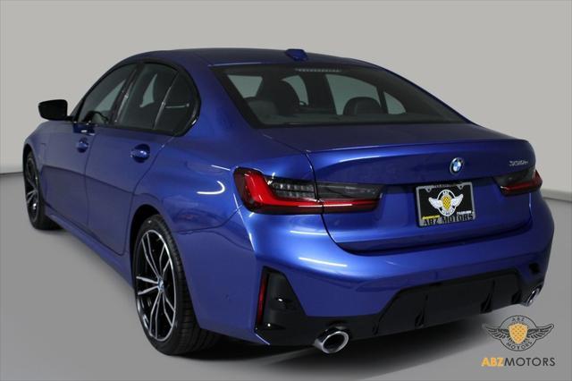 used 2023 BMW 330e car, priced at $34,991