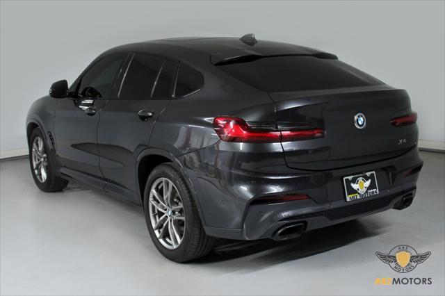 used 2021 BMW X4 car, priced at $37,991