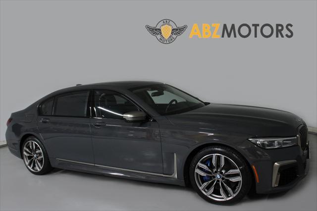 used 2022 BMW M760 car, priced at $73,991