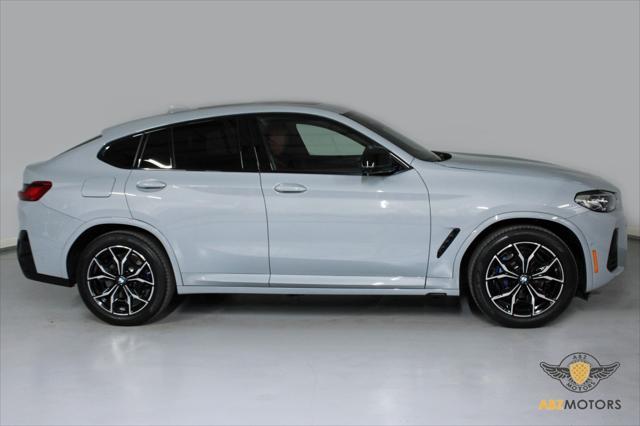 used 2024 BMW X4 car, priced at $63,991