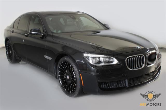 used 2013 BMW 750 car, priced at $14,991