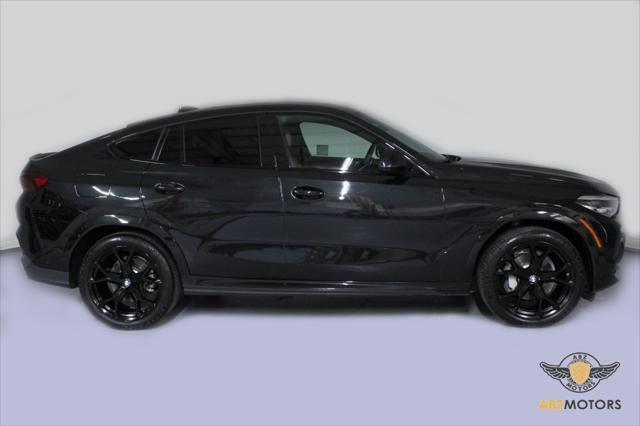 used 2022 BMW X6 car, priced at $56,991