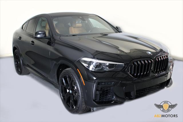 used 2022 BMW X6 car, priced at $56,991