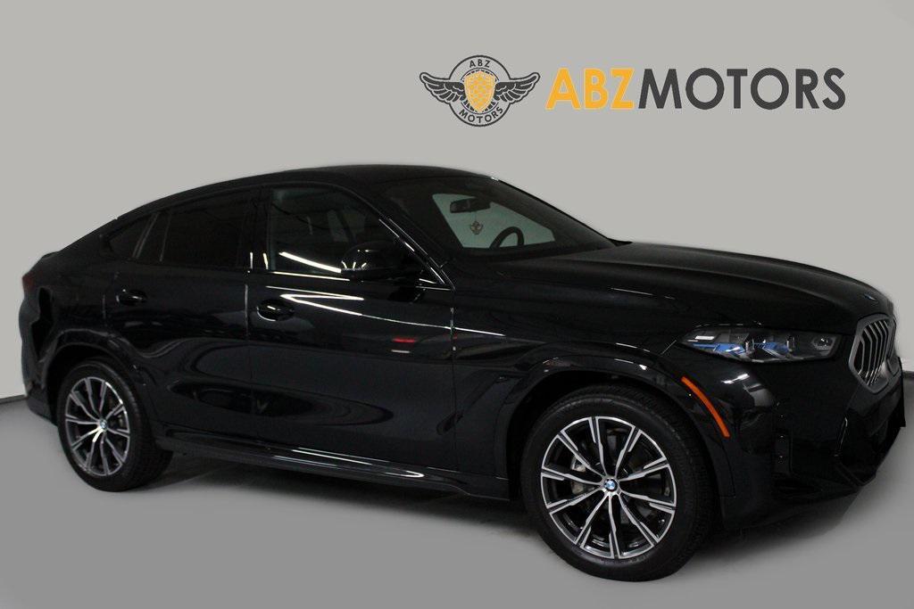 used 2025 BMW X6 car, priced at $72,991