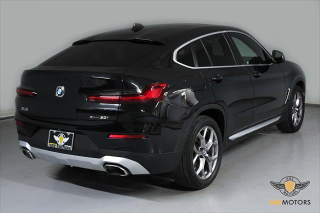 used 2022 BMW X4 car, priced at $33,491