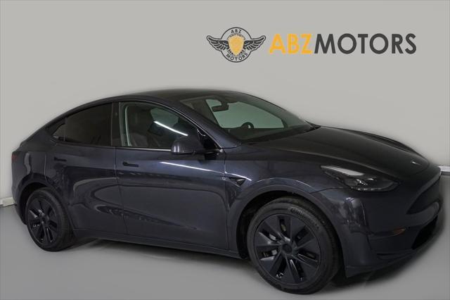 used 2024 Tesla Model Y car, priced at $32,991