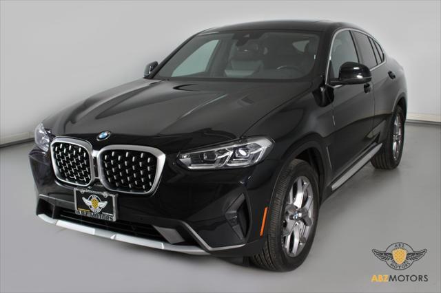 used 2023 BMW X4 car, priced at $42,991