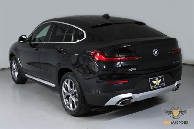 used 2023 BMW X4 car, priced at $42,991