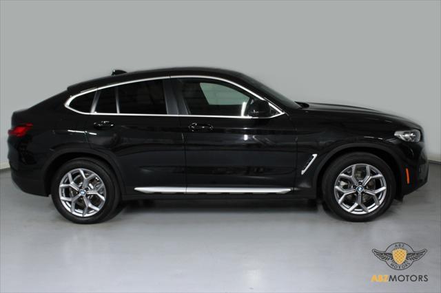 used 2023 BMW X4 car, priced at $42,991