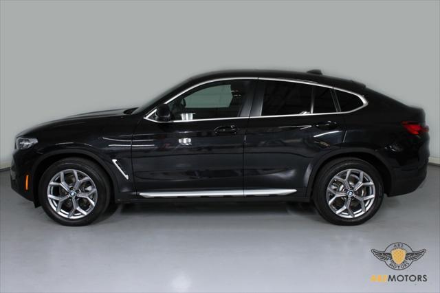 used 2023 BMW X4 car, priced at $42,991