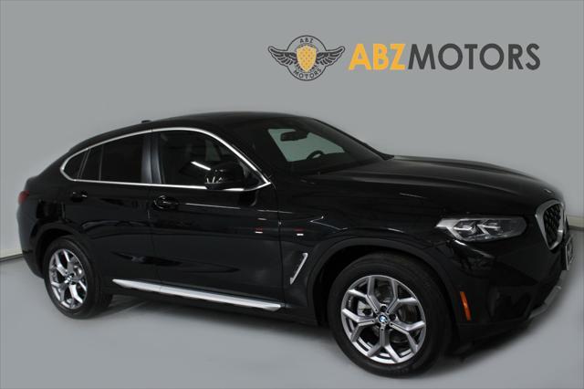 used 2023 BMW X4 car, priced at $42,991