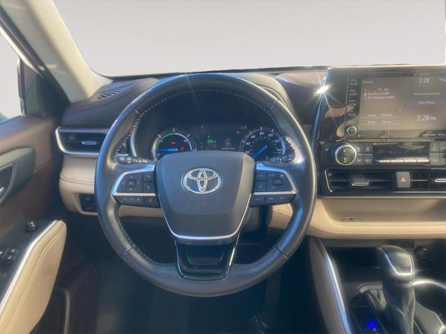 used 2021 Toyota Highlander Hybrid car, priced at $37,661