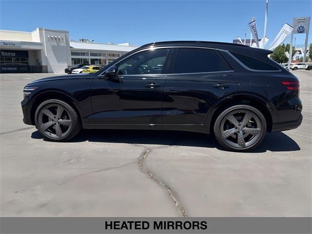 used 2025 Genesis GV70 car, priced at $58,995