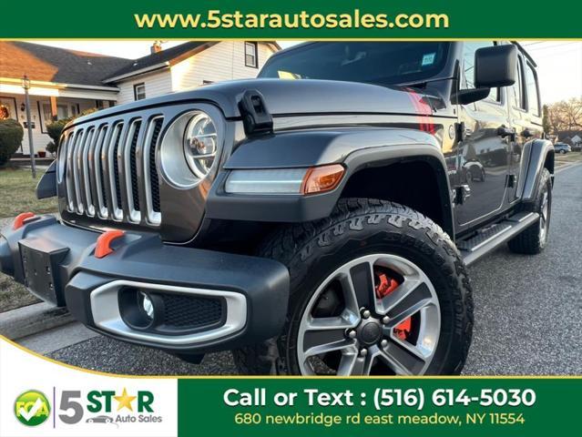 used 2021 Jeep Wrangler Unlimited car, priced at $30,900