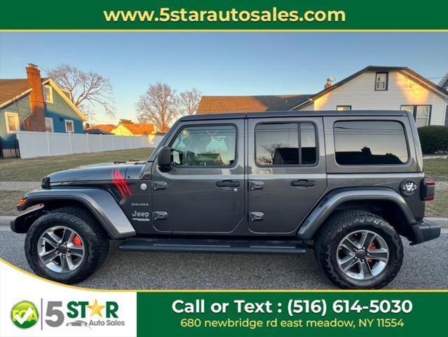 used 2021 Jeep Wrangler Unlimited car, priced at $30,900