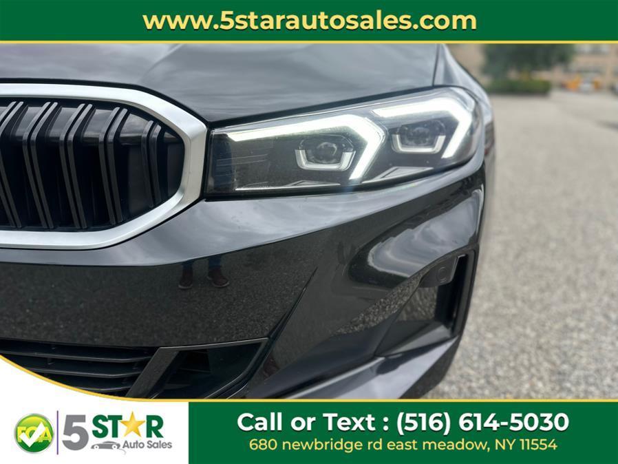 used 2024 BMW 330 car, priced at $21,400