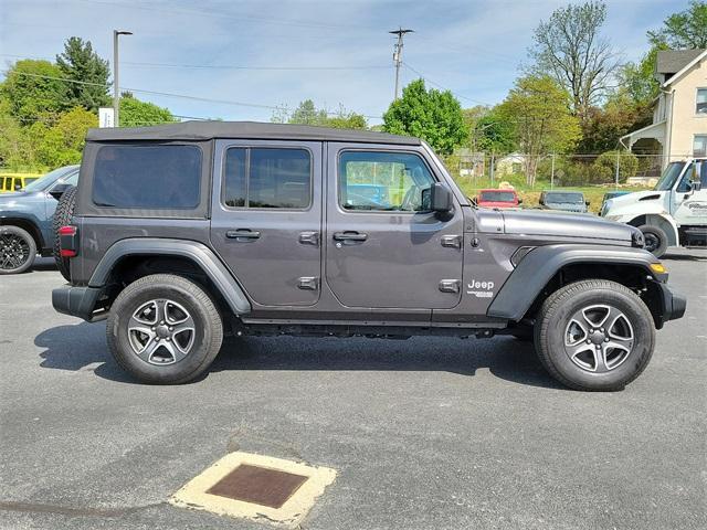 used 2021 Jeep Wrangler Unlimited car, priced at $32,894