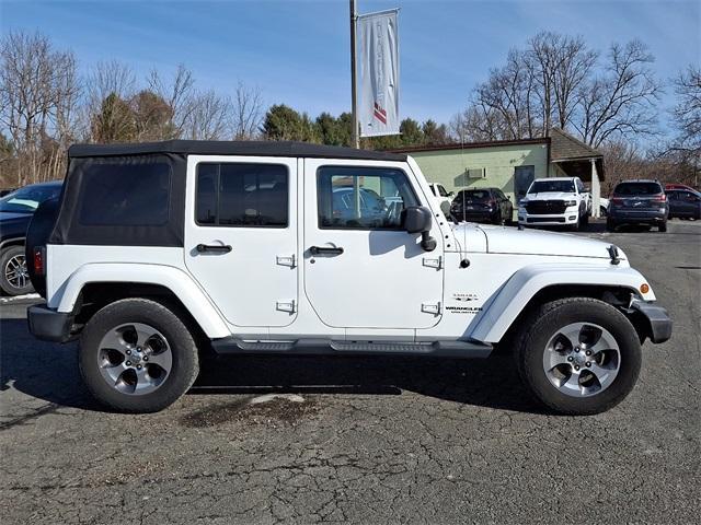 used 2016 Jeep Wrangler Unlimited car, priced at $15,557