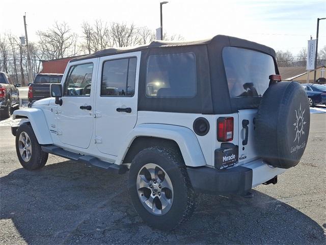 used 2016 Jeep Wrangler Unlimited car, priced at $15,557