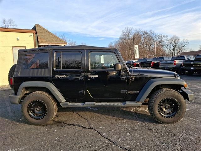 used 2012 Jeep Wrangler Unlimited car, priced at $17,110