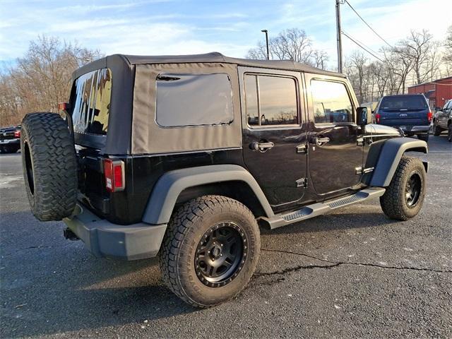 used 2012 Jeep Wrangler Unlimited car, priced at $17,110