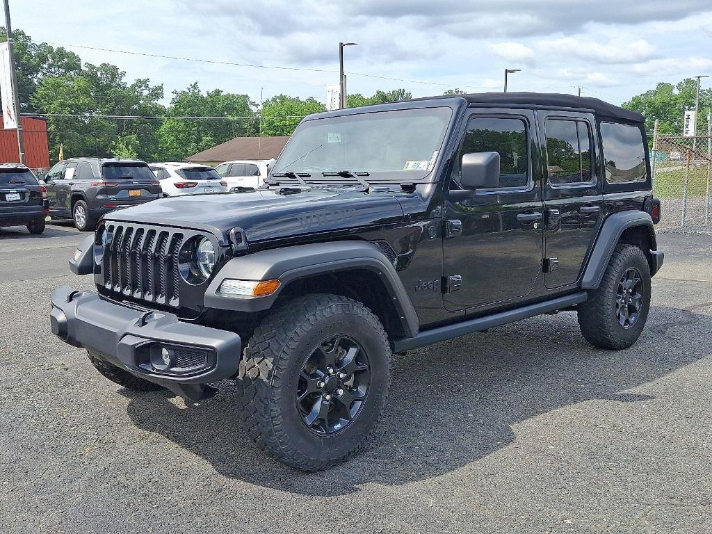 used 2022 Jeep Wrangler Unlimited car, priced at $31,558