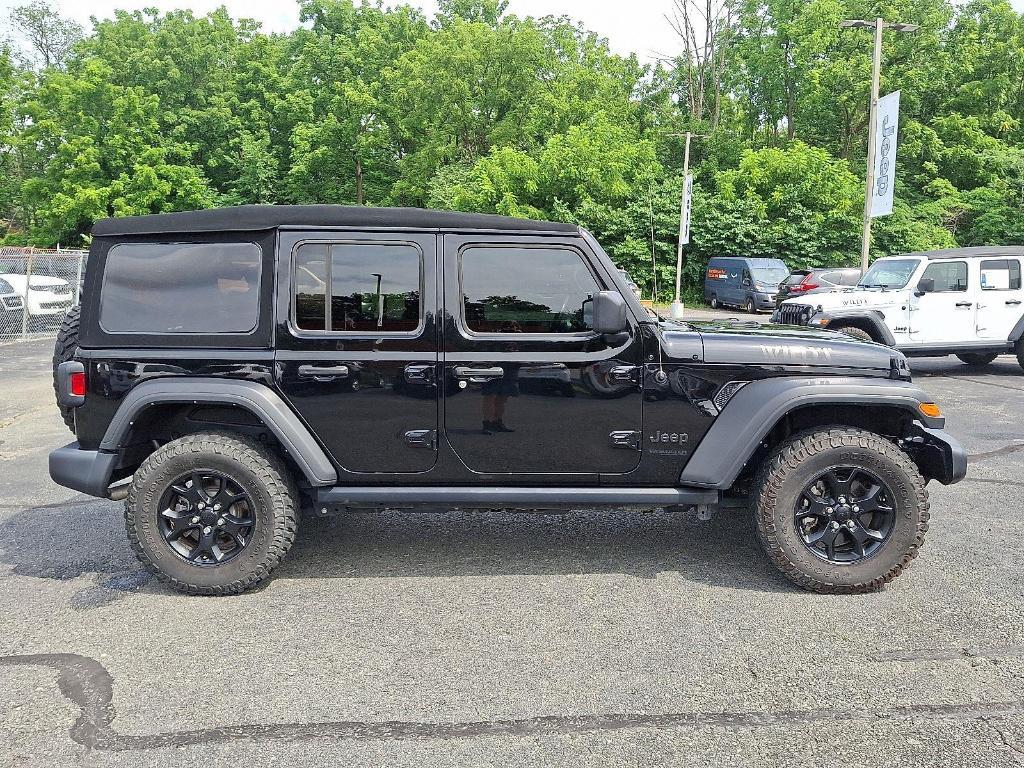 used 2022 Jeep Wrangler Unlimited car, priced at $31,558