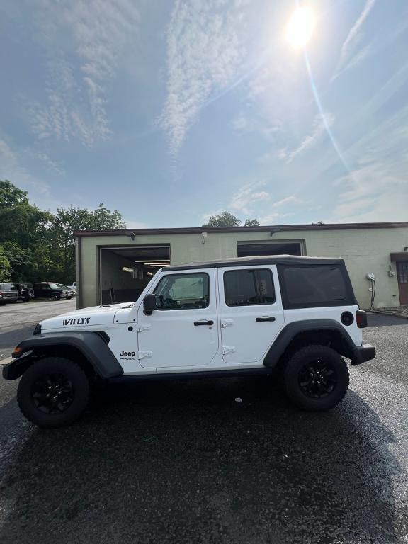 used 2021 Jeep Wrangler Unlimited car, priced at $32,477