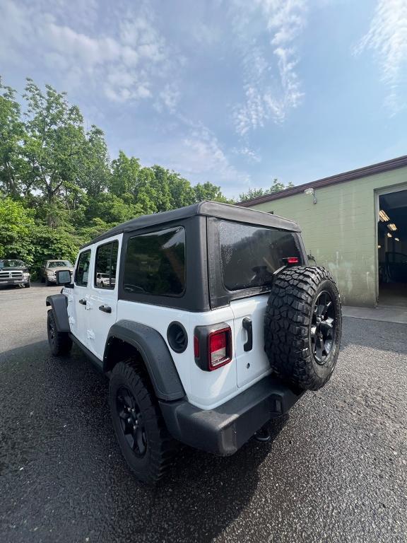 used 2021 Jeep Wrangler Unlimited car, priced at $32,477