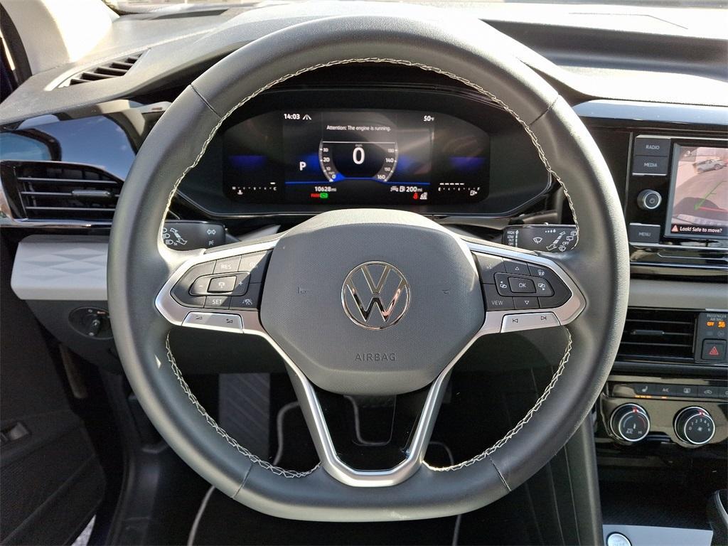 used 2023 Volkswagen Taos car, priced at $20,996