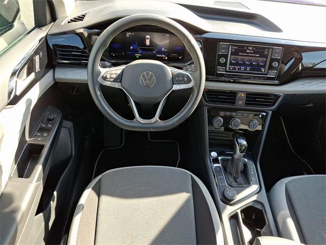 used 2023 Volkswagen Taos car, priced at $21,667