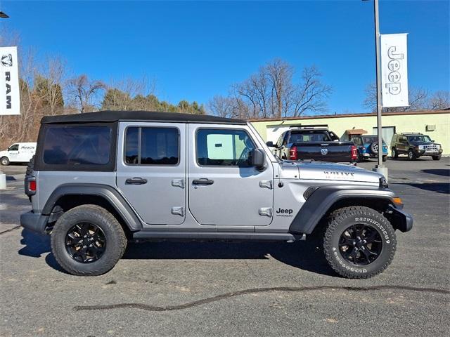 used 2021 Jeep Wrangler Unlimited car, priced at $30,176