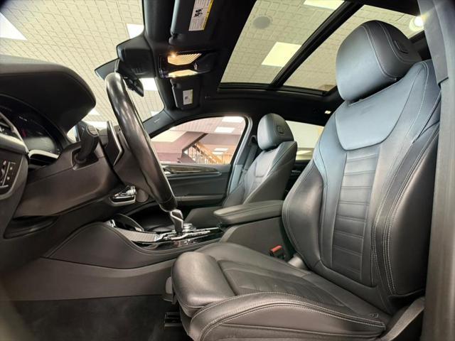 used 2021 BMW X4 M car, priced at $39,500