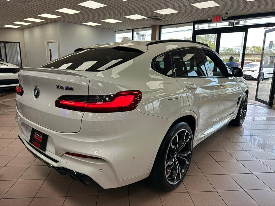 used 2021 BMW X4 M car, priced at $38,700