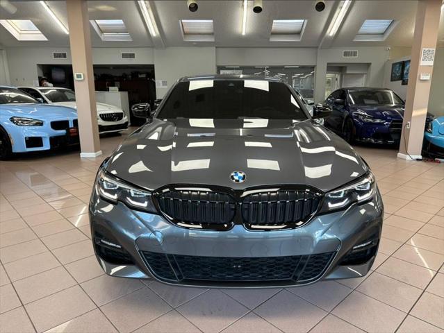 used 2022 BMW 330 car, priced at $26,700