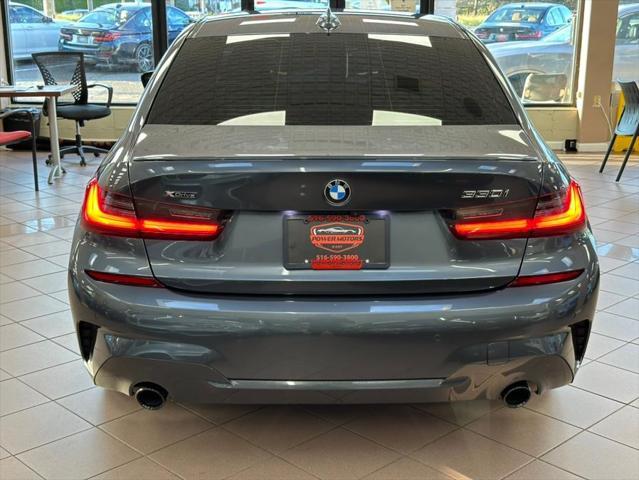 used 2022 BMW 330 car, priced at $26,700