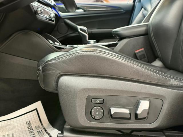 used 2021 BMW X3 M car, priced at $46,900